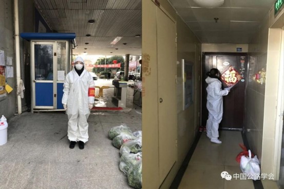 图14：公司协诚环保党支部周洁同志在武汉市中南路街洪山坊社区承担社区值班、分发菜品、入户体温摸排工作。